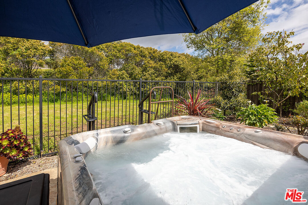 6372 Lagunitas Court Carpinteria, CA 93013 - Photo 19 of 19 a white building with a yard