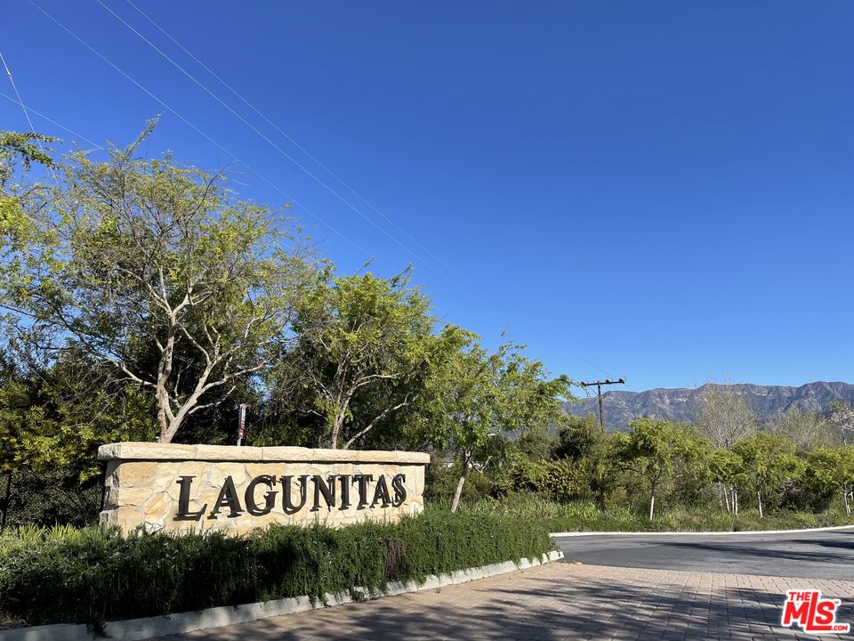 6372 Lagunitas Court Carpinteria, CA 93013 - Photo 2 of 19 a view of a street with a building in the background