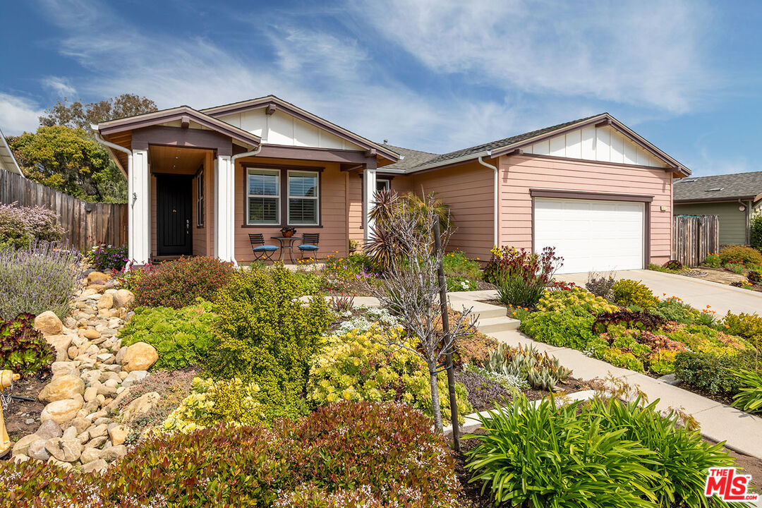 6372 Lagunitas Court Carpinteria, CA 93013 - Photo 3 of 19 a front view of a house with garden