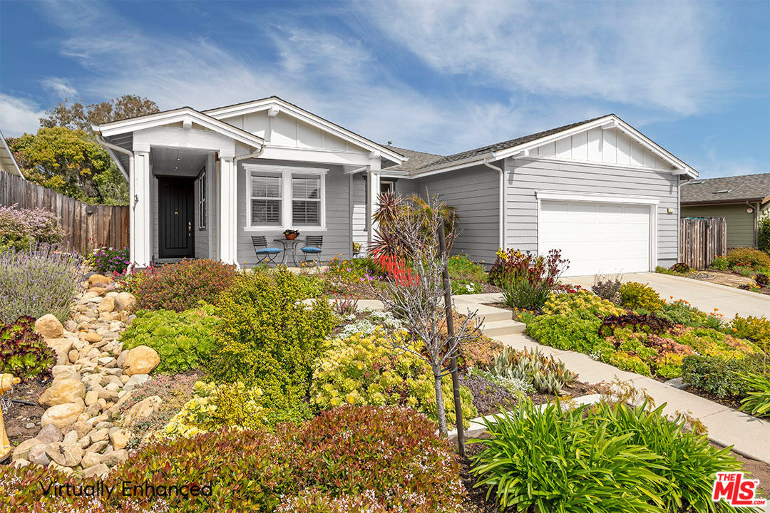 6372 Lagunitas Court Carpinteria, CA 93013 - Photo 4 of 19 a front view of a house with garden