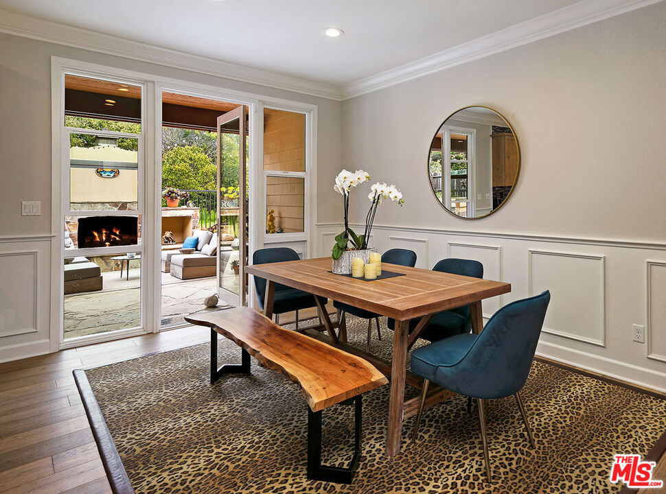 6372 Lagunitas Court Carpinteria, CA 93013 - Photo 8 of 19 a living room with furniture a rug and a large window
