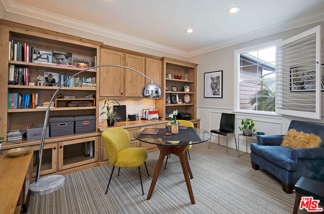 6372 Lagunitas Court Carpinteria, CA 93013 - Photo 10 of 19 a work room with furniture window and wooden floor
