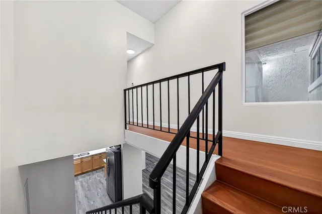 a view of entryway with wooden floor