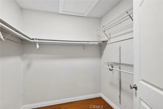 a view of a room with racks on the wall