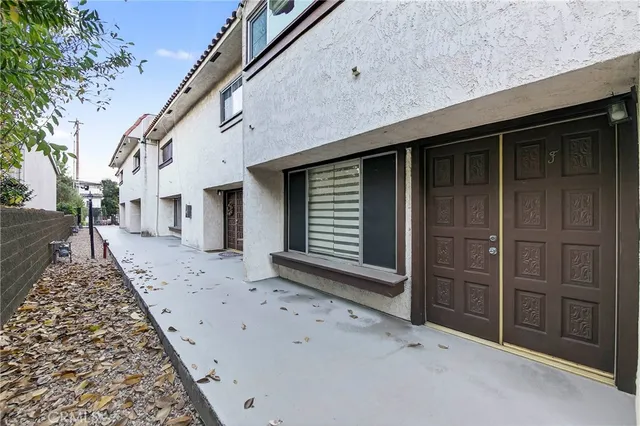 front view of a house with a large window