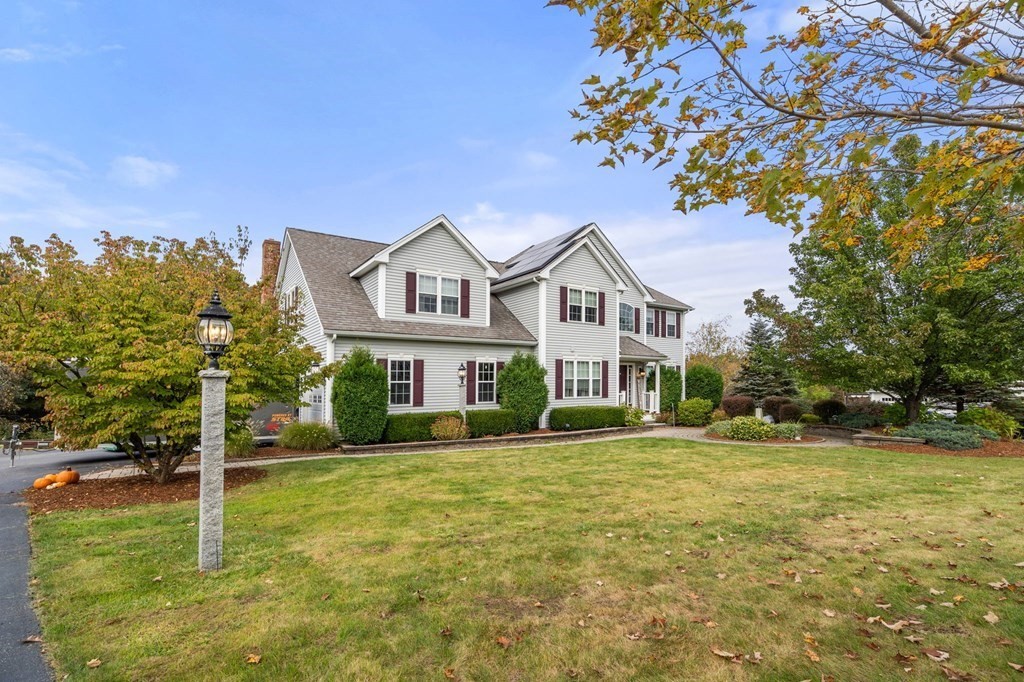 10 Brook Hill Road Sturbridge, MA 01518 - Photo 2 of 35 a front view of a house with a garden