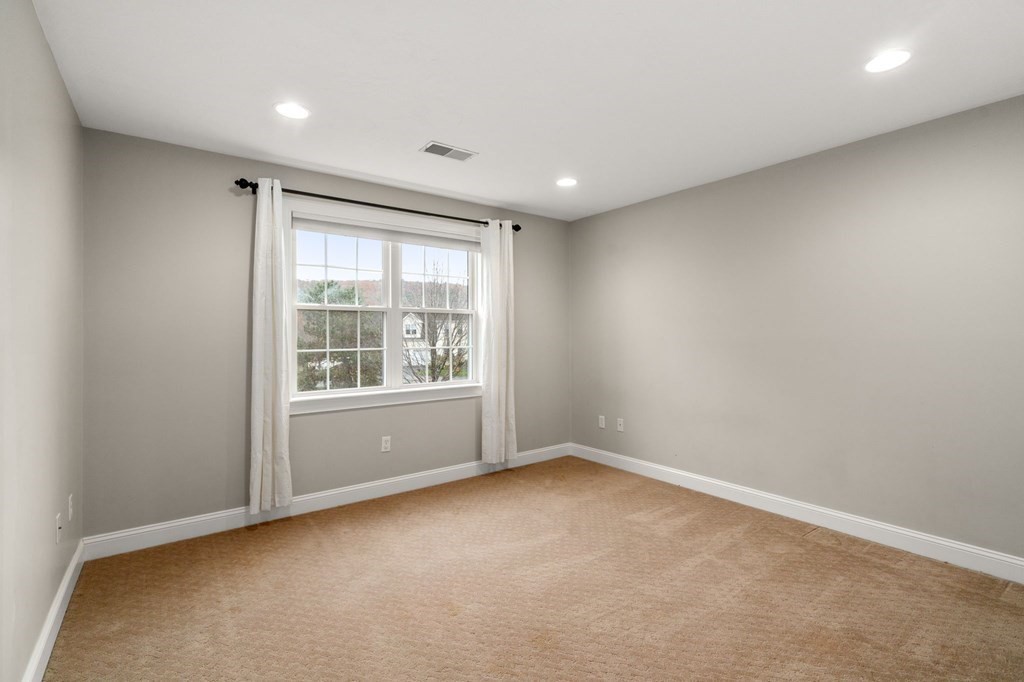 10 Brook Hill Road Sturbridge, MA 01518 - Photo 26 of 35 an empty room with a window