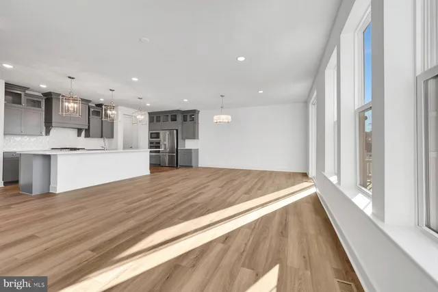 a view of kitchen with wooden floor