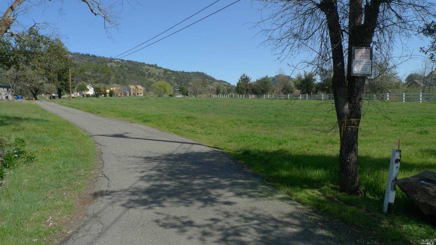 4200 Wallace Road Santa Rosa, CA 95404 - Photo 1 of 1 a view of a grassy field with trees