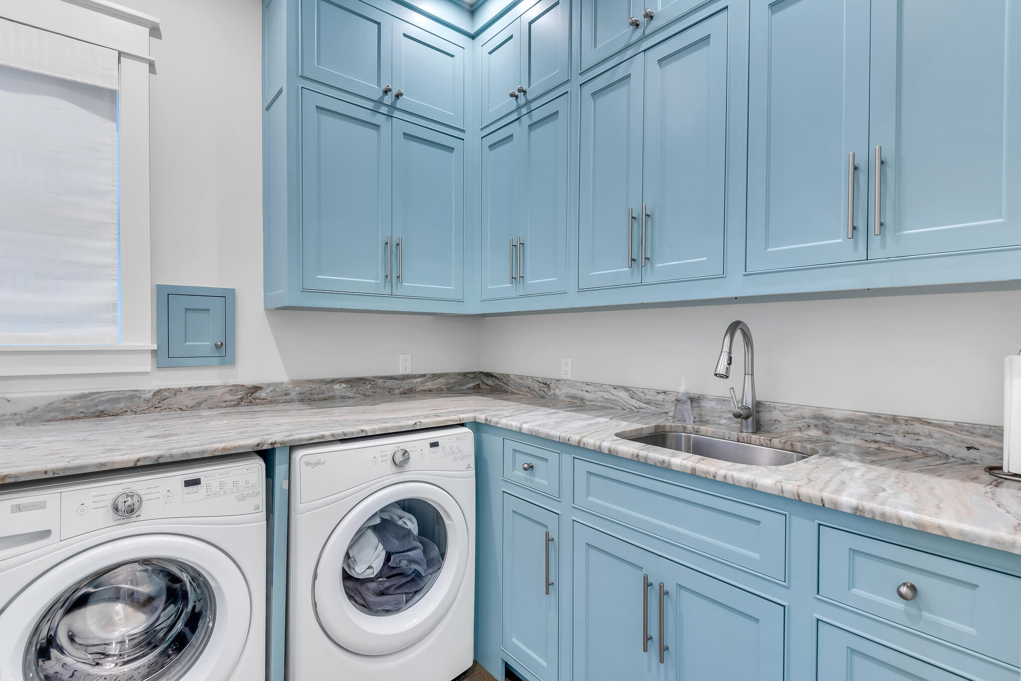 57 Salt Box Lane West Inlet Beach, FL 32461 - Photo 14 of 74 a utility room with granite countertop cabinets washer and dryer