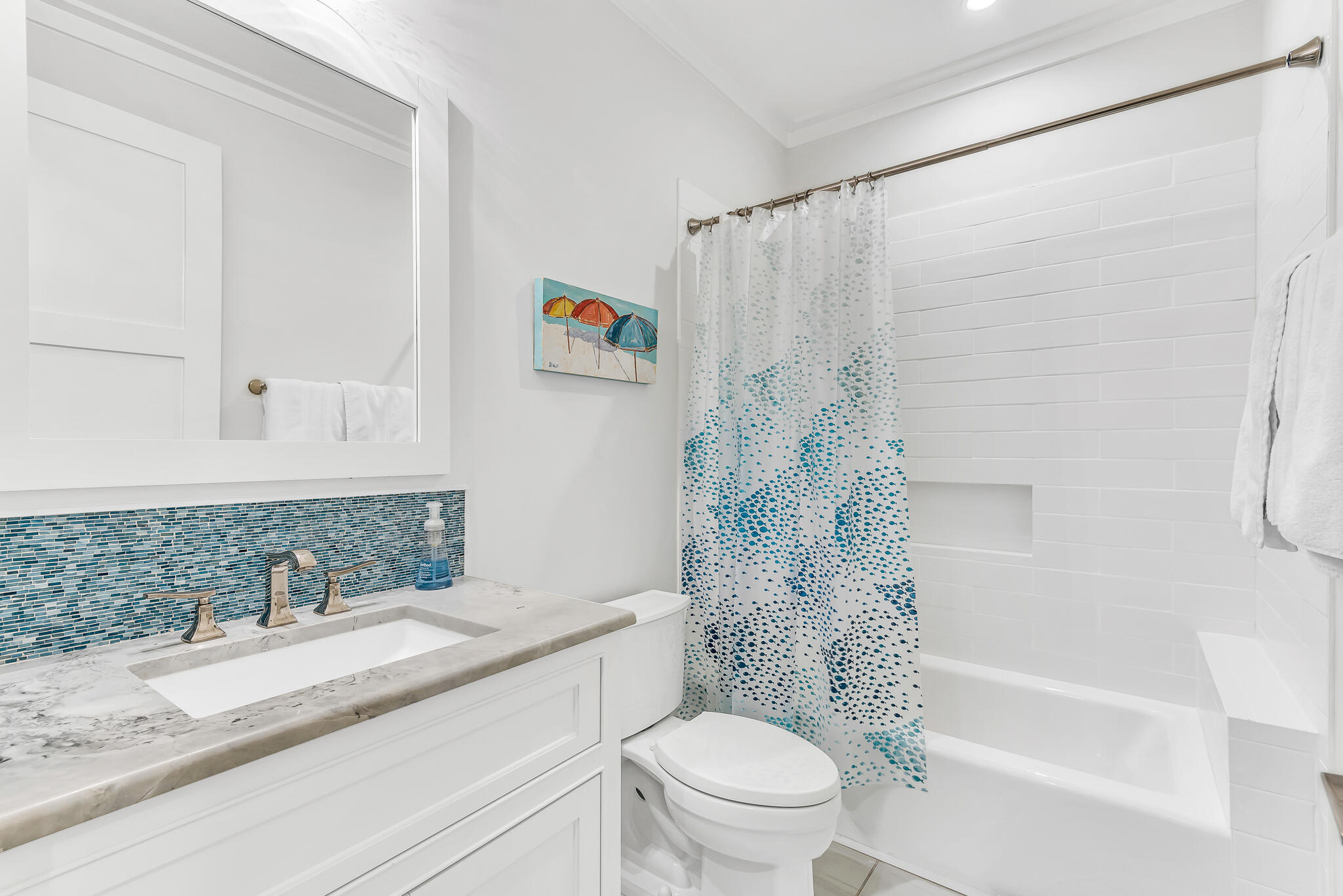 57 Salt Box Lane West Inlet Beach, FL 32461 - Photo 34 of 74 a bathroom with a granite countertop sink a toilet and a bathtub