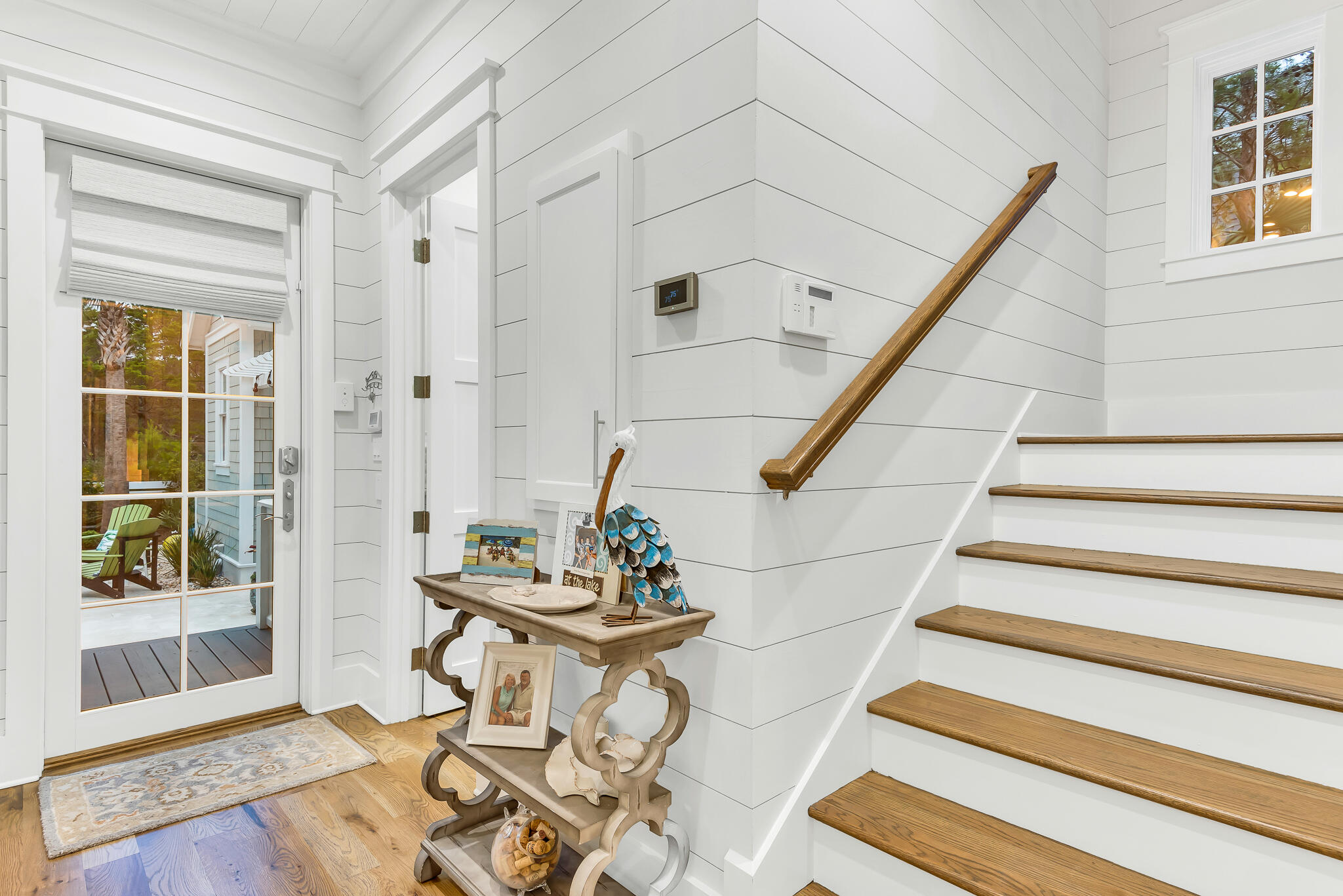 57 Salt Box Lane West Inlet Beach, FL 32461 - Photo 36 of 74 a view of an entryway with wooden floor and a rug