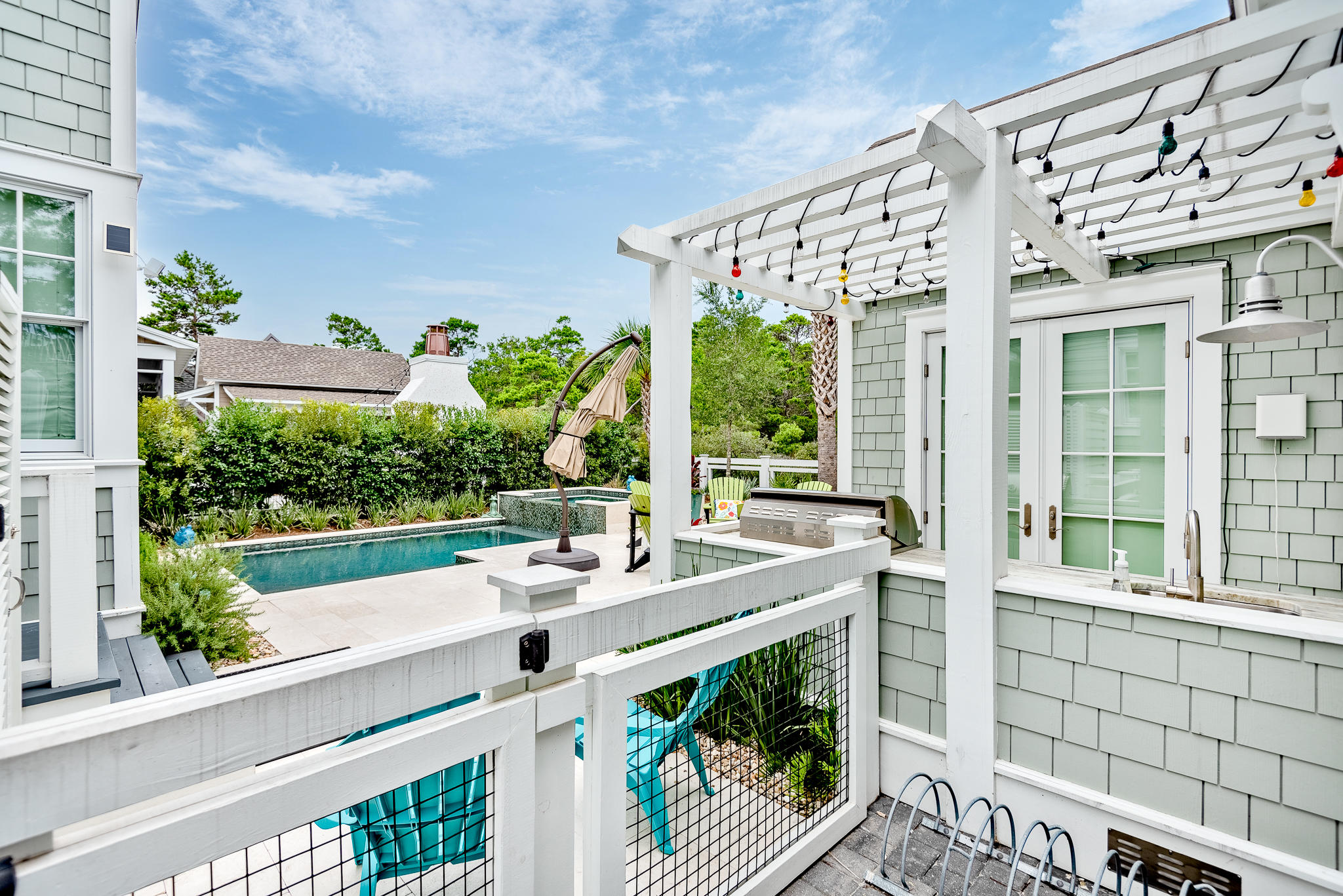 57 Salt Box Lane West Inlet Beach, FL 32461 - Photo 46 of 74 a view of a house with a balcony and furniture