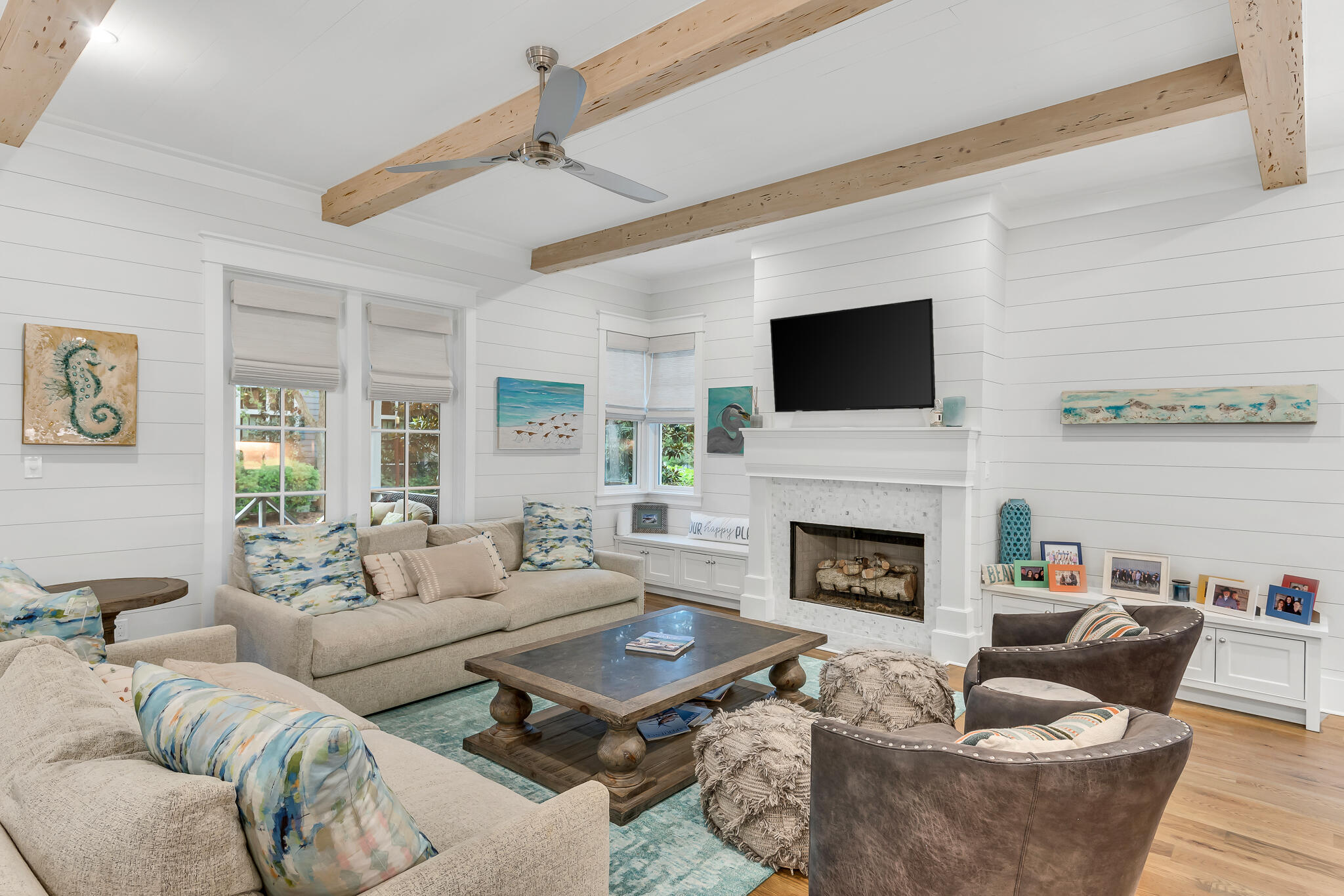 57 Salt Box Lane West Inlet Beach, FL 32461 - Photo 7 of 74 a living room with furniture a fireplace and a flat screen tv