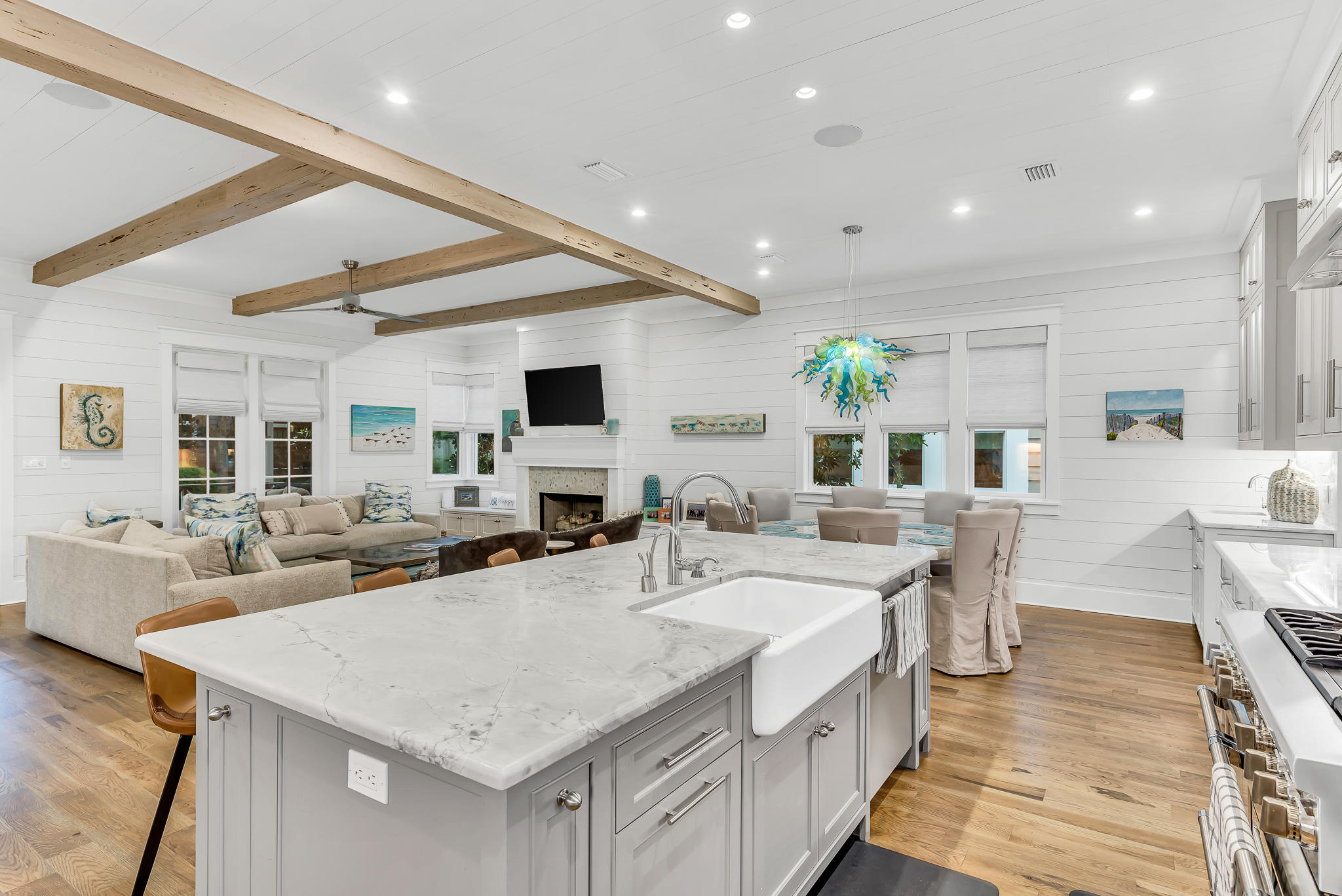 57 Salt Box Lane West Inlet Beach, FL 32461 - Photo 10 of 74 a large kitchen with kitchen island a sink table and chairs
