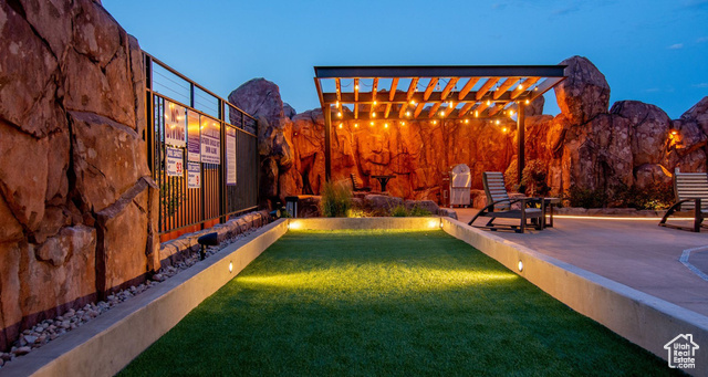 2331 Mesa Road, Unit E3 Moab, UT 84532 - Photo 53 of 71 View of yard featuring a patio, a mountain view, and a pergola