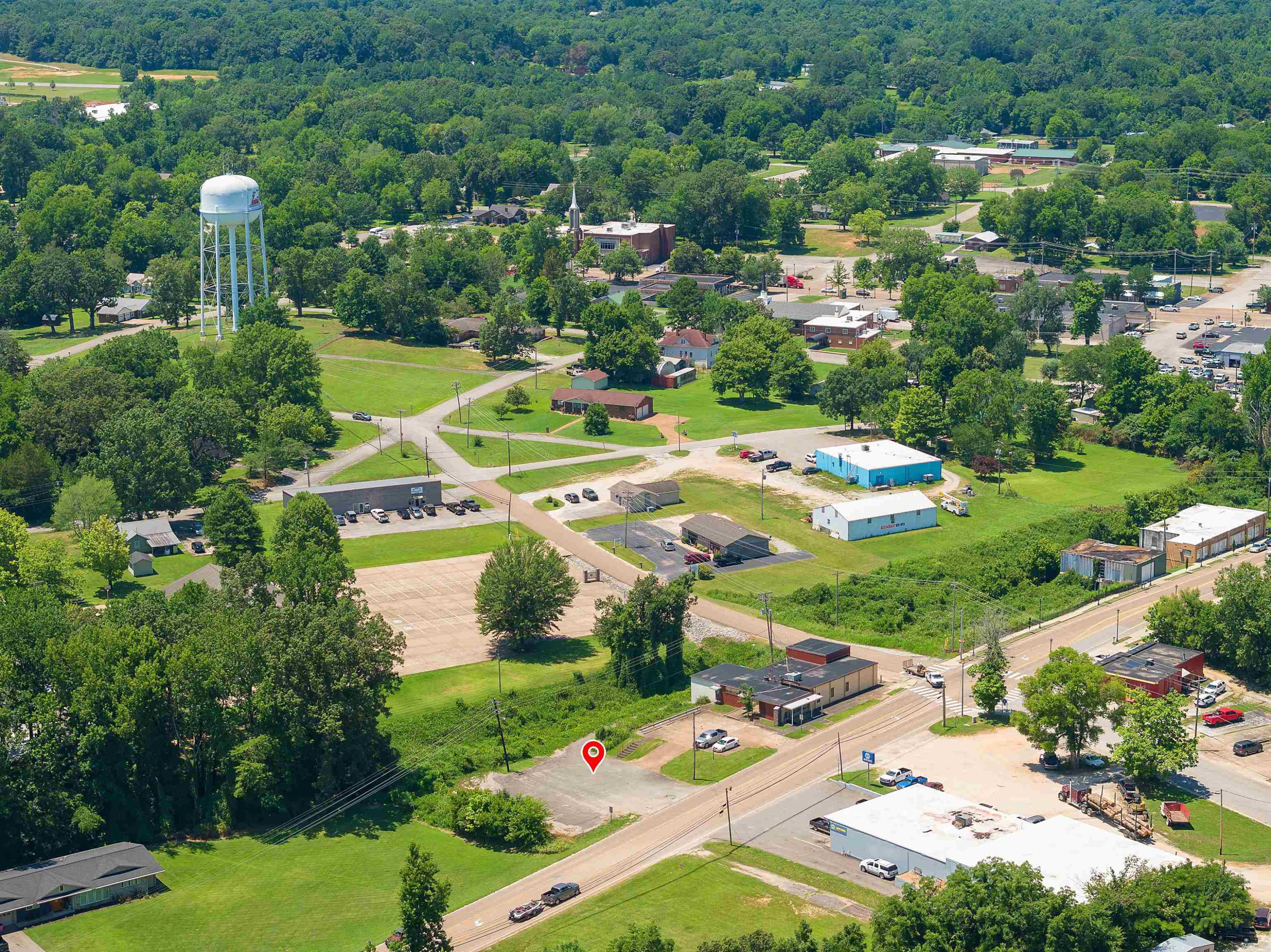 0 East Main Street Parsons, TN 38363 - Photo 6 of 10 an aerial view of residential houses with outdoor space and street view