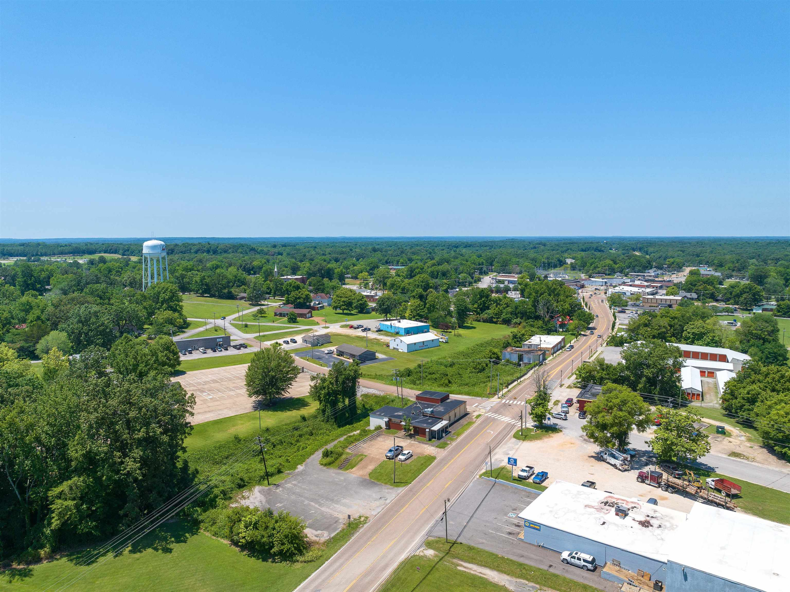 0 East Main Street Parsons, TN 38363 - Photo 7 of 10 an aerial view of residential houses with outdoor space and trees
