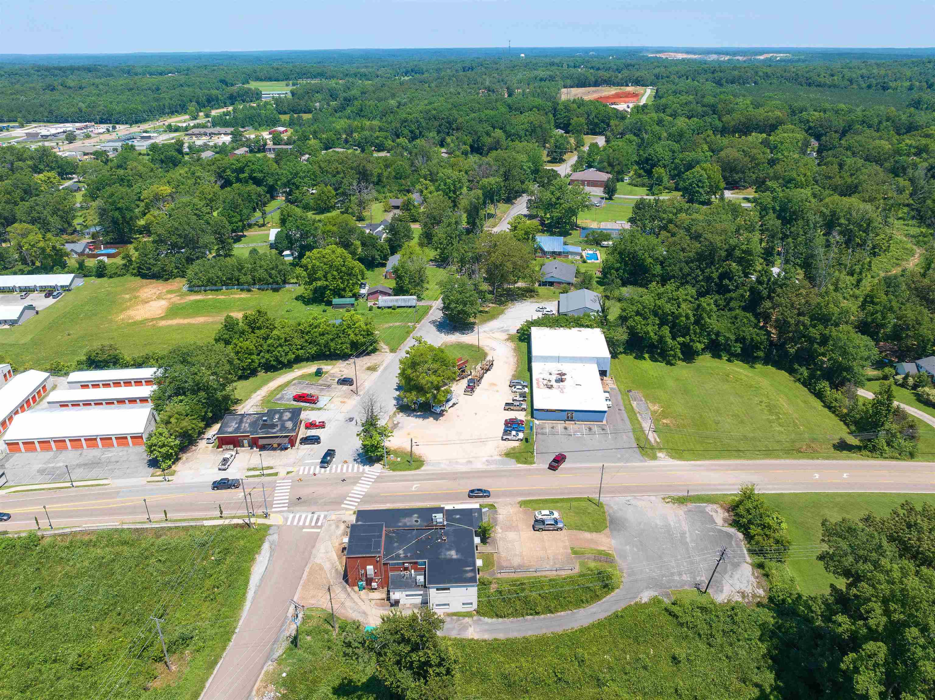 0 East Main Street Parsons, TN 38363 - Photo 9 of 10 an aerial view of house with yard swimming pool and outdoor seating
