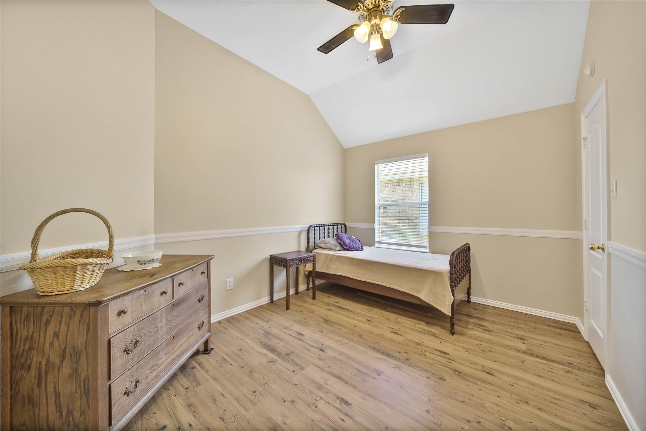 21338 Timber Pines Drive Spring, TX 77388 - Photo 22 of 29 a spacious bedroom with a bed and a dresser