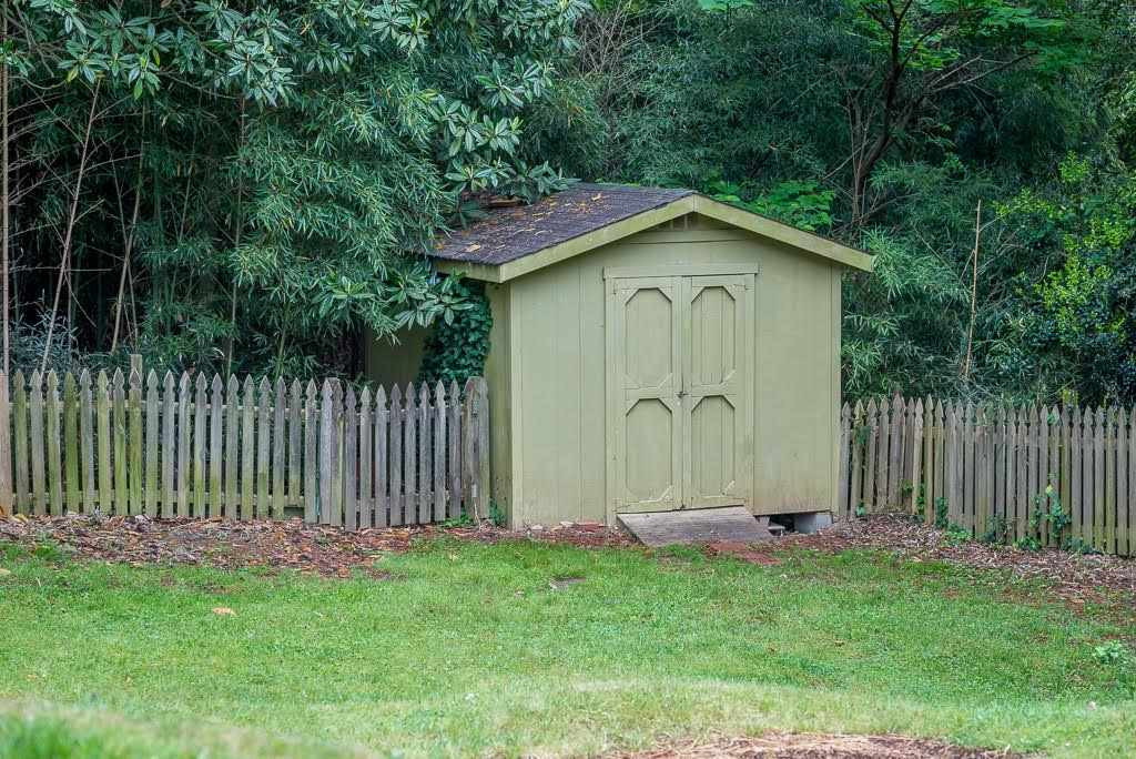 4220 Rowan Street Raleigh, NC 27609 - Photo 23 of 24 Tucked away in the corner of the yard and gives some extra storage. Shed