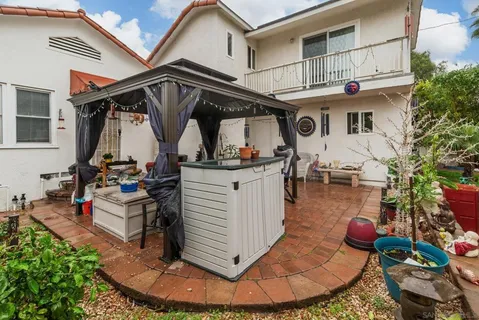 a outdoor space with lots of potted plants