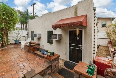 a kitchen with stainless steel appliances granite countertop a refrigerator and a stove