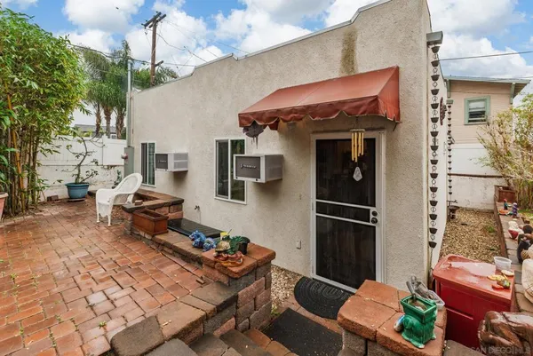 a kitchen with stainless steel appliances granite countertop a refrigerator and a stove