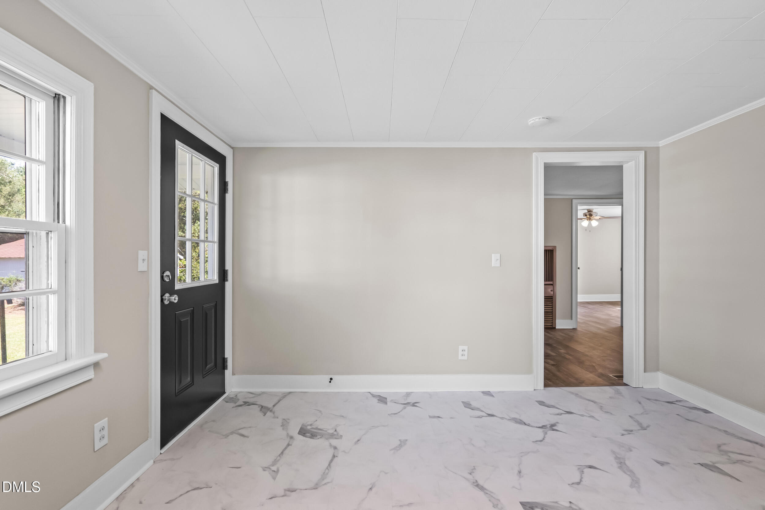 5511 Flower Hill Road Kenly, NC 27542 - Photo 18 of 33 an empty room with windows