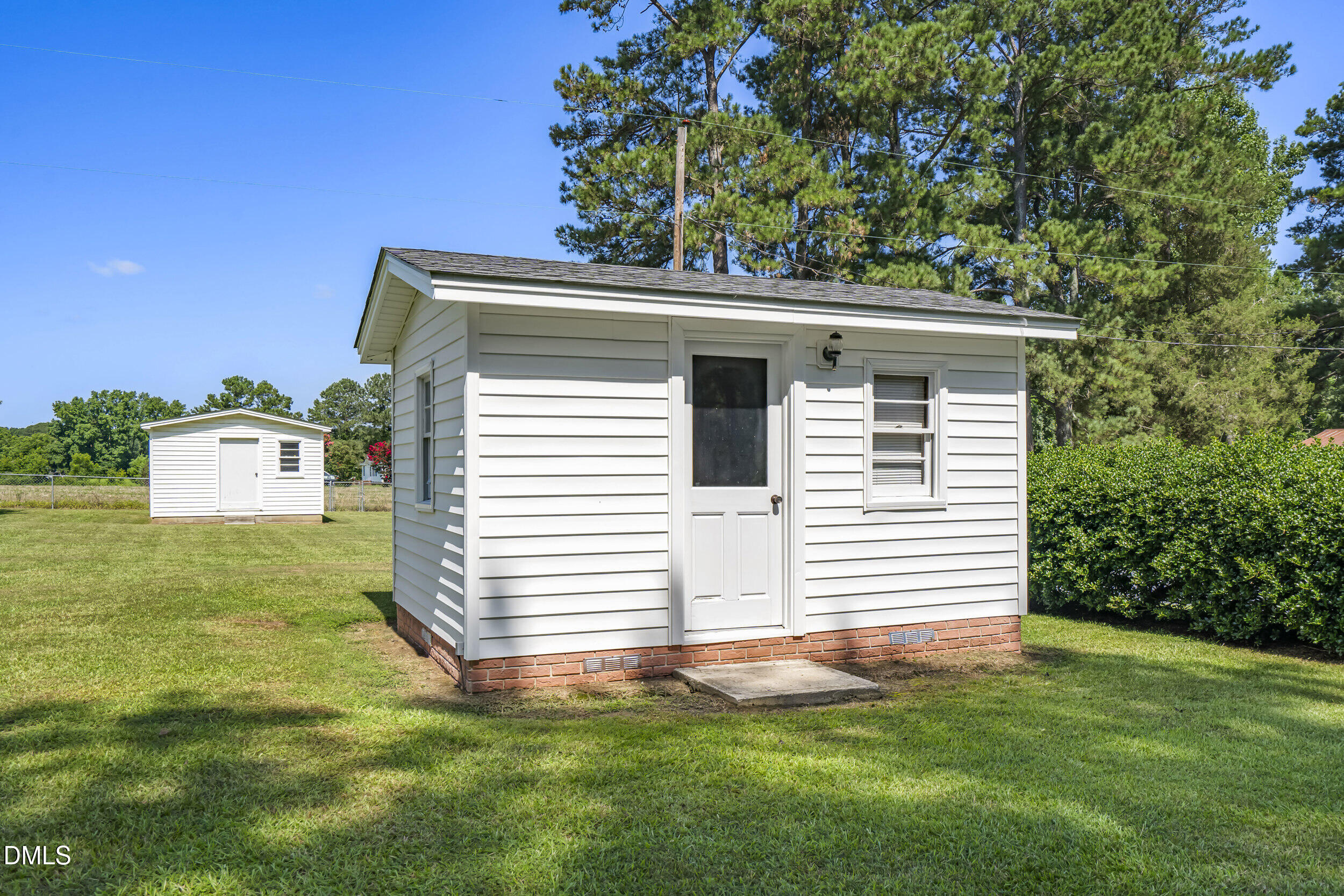 5511 Flower Hill Road Kenly, NC 27542 - Photo 32 of 33 a front view of a house with a yard