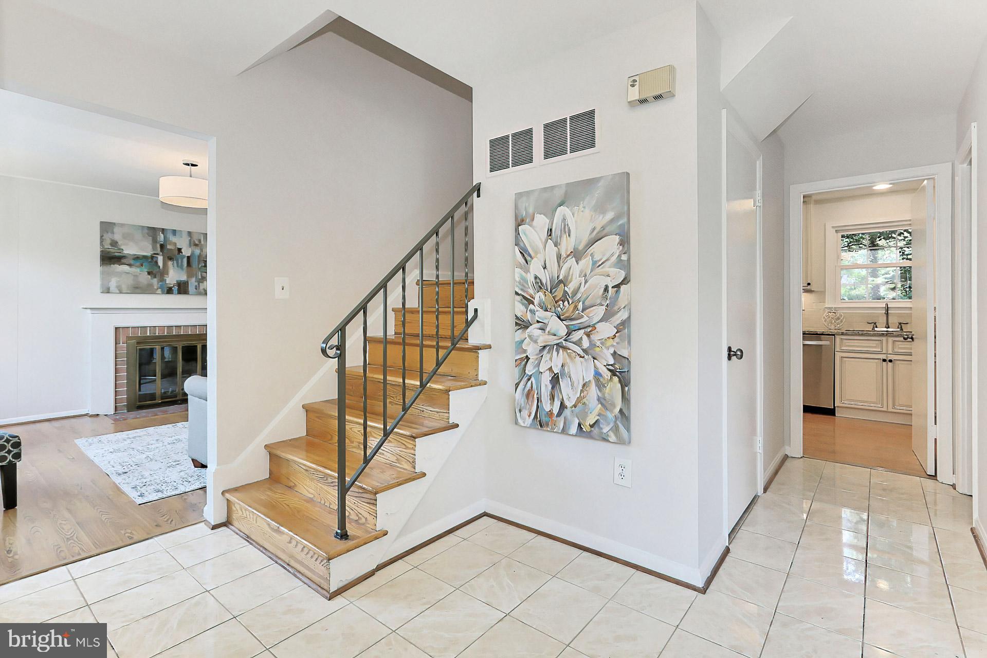 6808 Sydenstricker Road Springfield, VA 22153 - Photo 7 of 65 Welcoming foyer with ceramic tile flooring