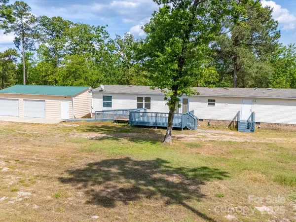a house view with a swimming pool