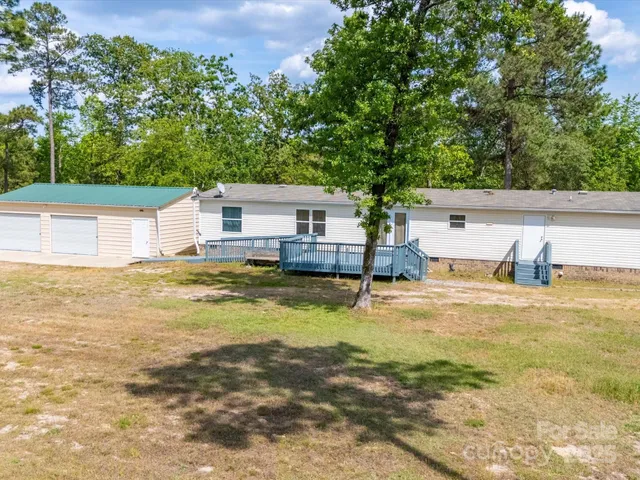 a house view with a swimming pool