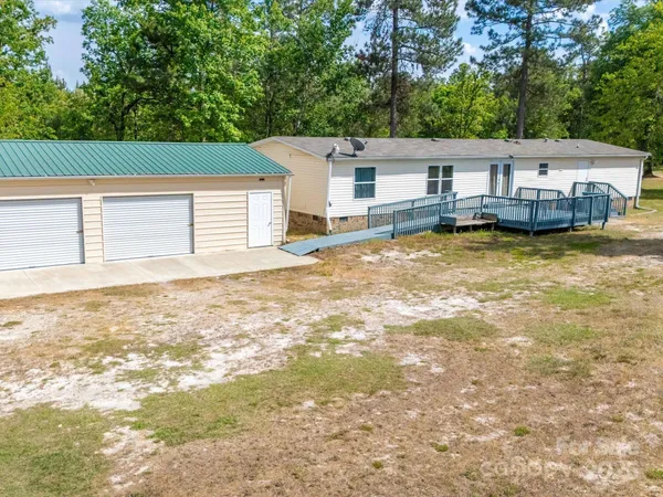 a view of a swimming pool with an outdoor space