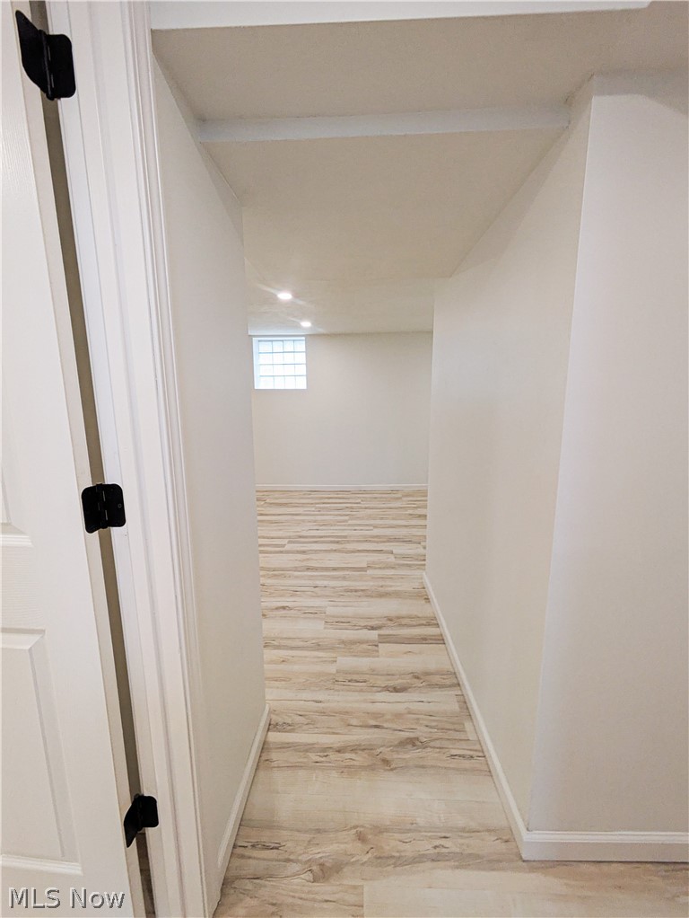 3554 Ludgate Road Shaker Heights, OH 44120 - Photo 40 of 50 Hallway with wood-finish flooring, recessed lighting, and a glass block window
