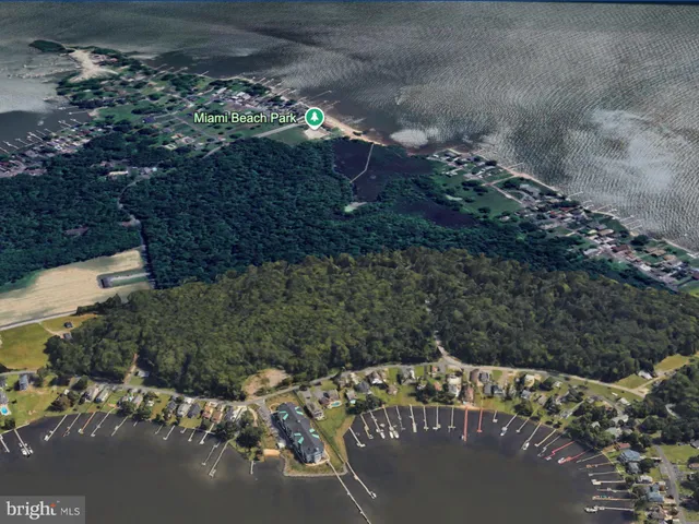 a view of a sign board with a yard