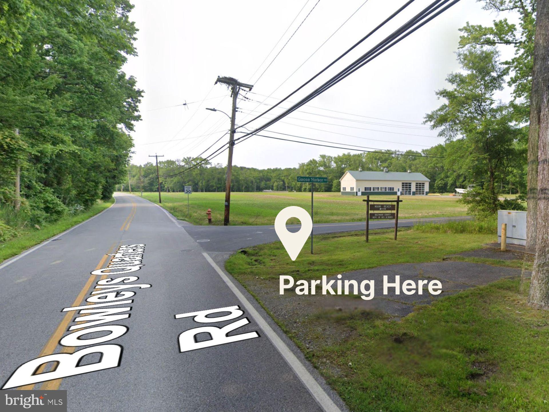 Bowleys Quarters Road Middle River, MD 21220 - Photo 7 of 8 a view of a sign board with a yard