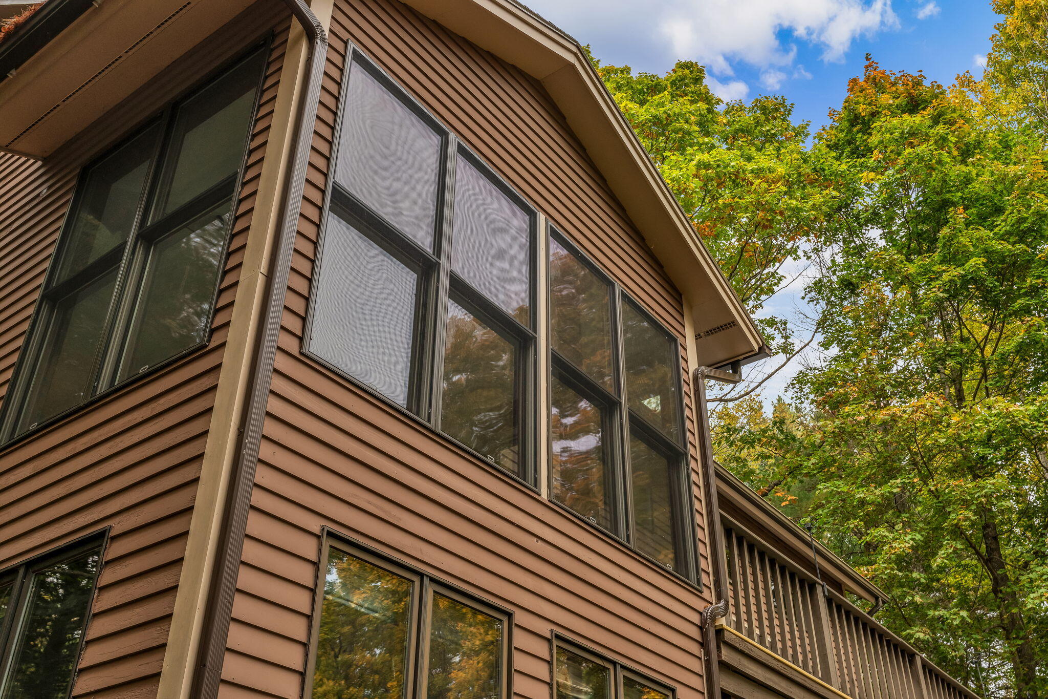 443 Main Road North Hampden, ME 04444 - Photo 55 of 66 Exterior sunroom windows