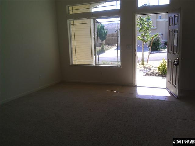 5040 Coggins Road Reno, NV 89506 - Photo 3 of 6 a view of an empty room with a window