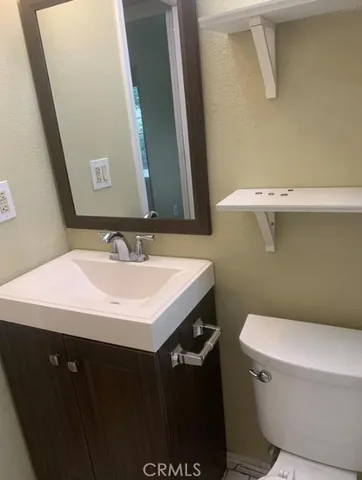 a bathroom with a sink and a toilet