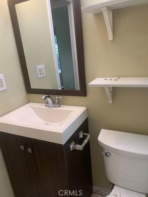 12 Whitecloud Irvine, CA 92614 - Photo 8 of 9 a bathroom with a sink and a toilet