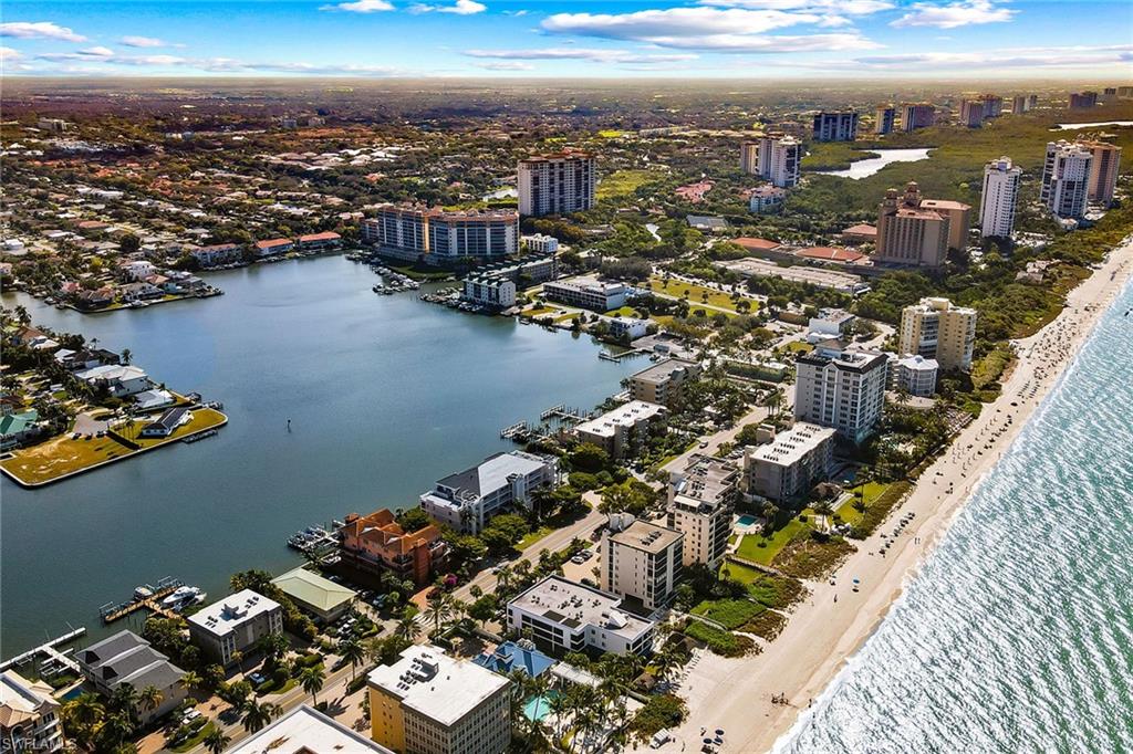 9101 Vanderbilt Drive, Unit 301 Naples, FL 34108 - Photo 26 of 28 an aerial view of a city