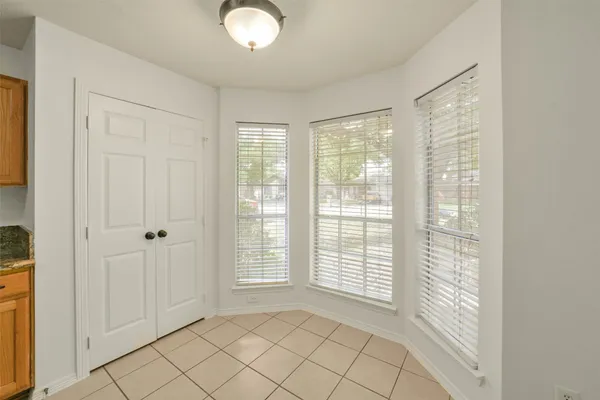 a view of an empty room with window