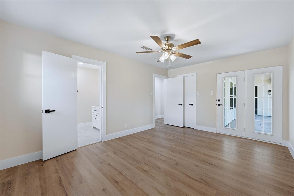 1145 Terrace Trail Hurst, TX 76053 - Photo 17 of 36 a view of an empty room with wooden floor