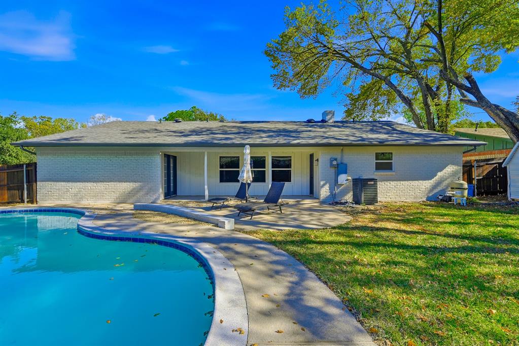 1145 Terrace Trail Hurst, TX 76053 - Photo 27 of 36 a view of a house with pool and sitting area