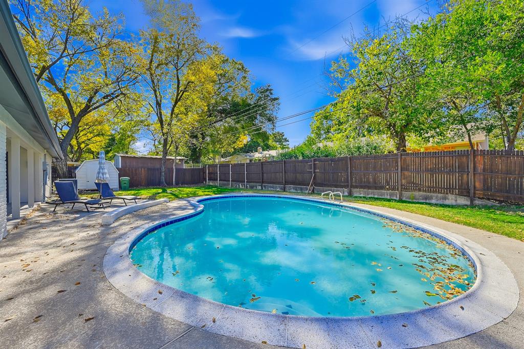 1145 Terrace Trail Hurst, TX 76053 - Photo 3 of 36 a view of a swimming pool with a backyard