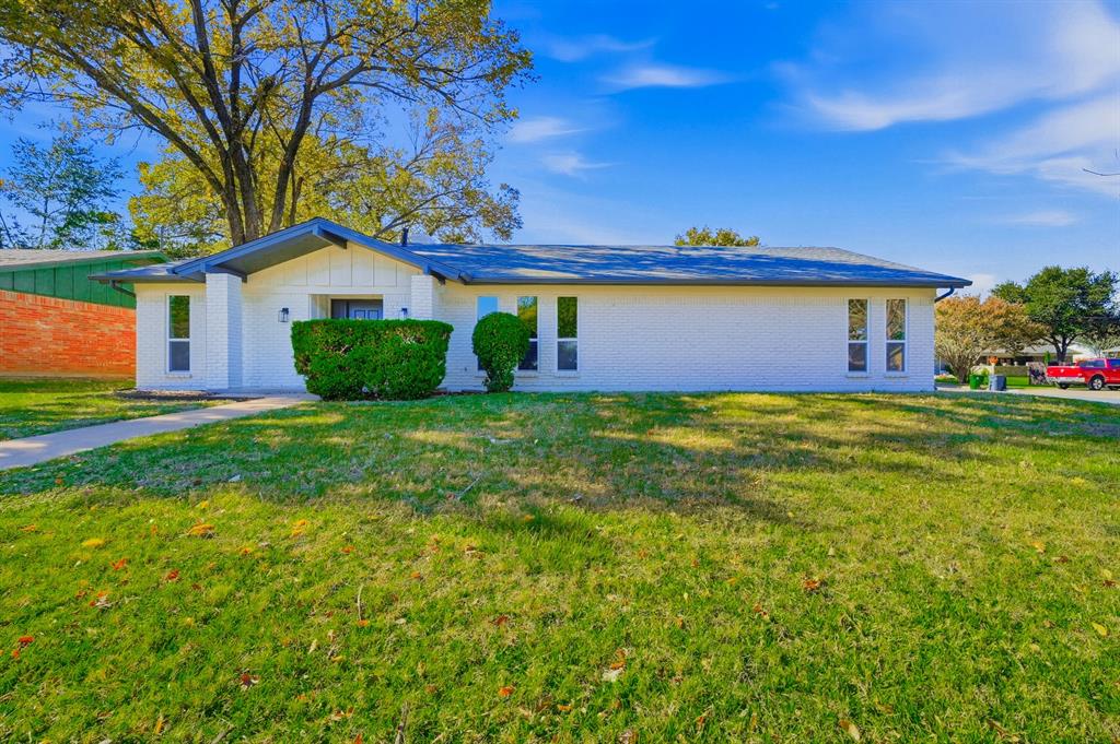 1145 Terrace Trail Hurst, TX 76053 - Photo 36 of 36 a view of a house with a yard and a large tree