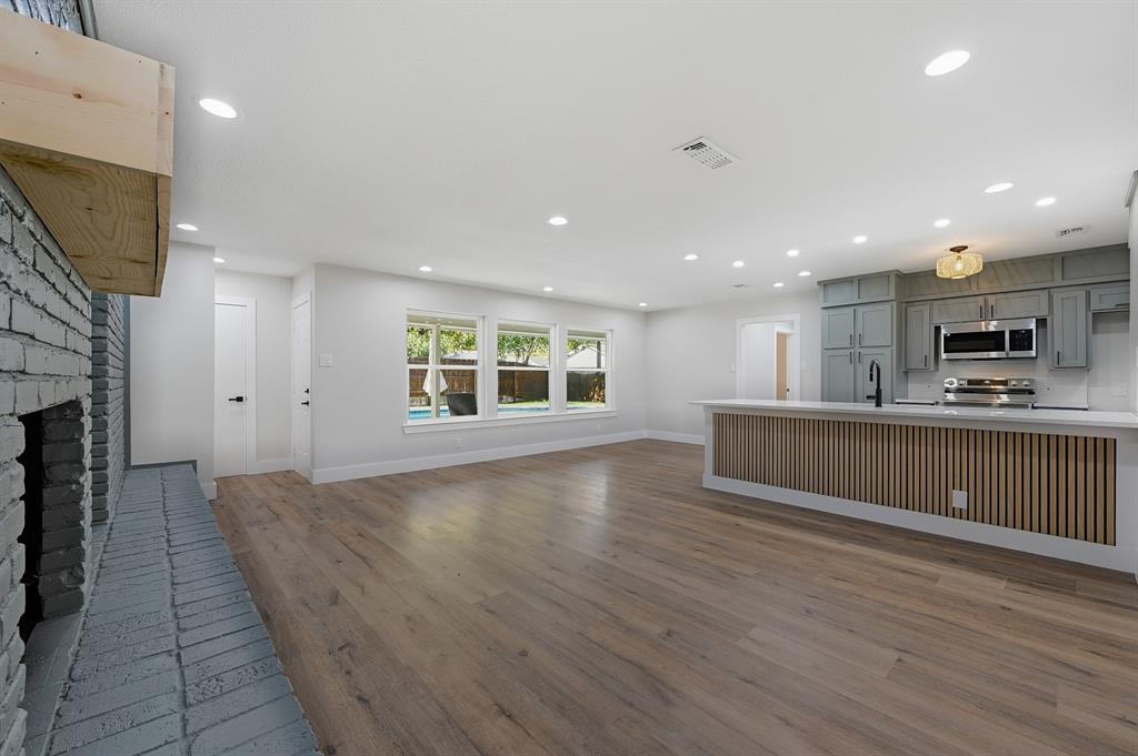 1145 Terrace Trail Hurst, TX 76053 - Photo 4 of 36 a view of kitchen with sink and microwave