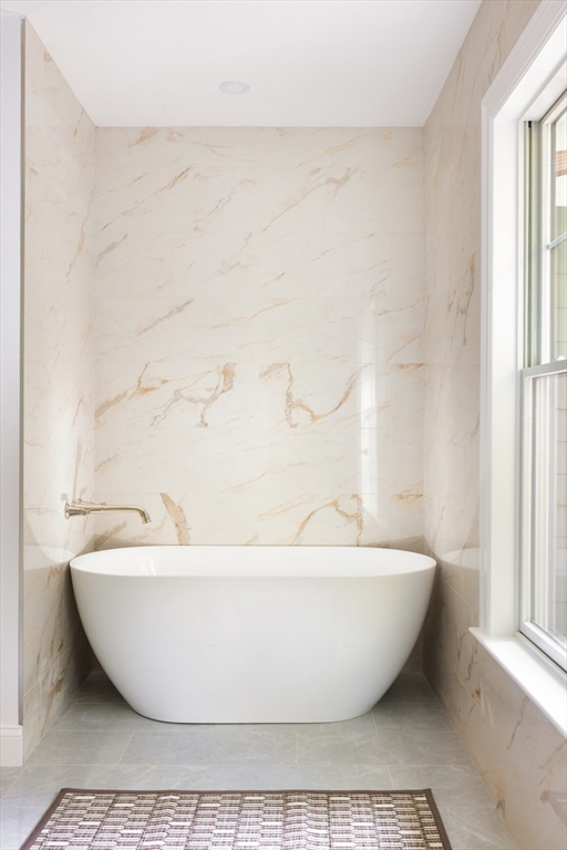 85 Naples Road, Unit 2 Brookline, MA 02446 - Photo 13 of 28 a white tub sitting next to a window