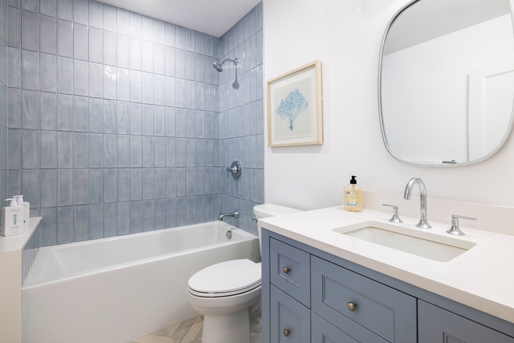 85 Naples Road, Unit 2 Brookline, MA 02446 - Photo 16 of 28 a bathroom with a sink a toilet and bathtub